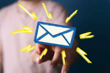 Bright, modern image of a hand presenting an email icon. Perfect for communication, marketing, and...