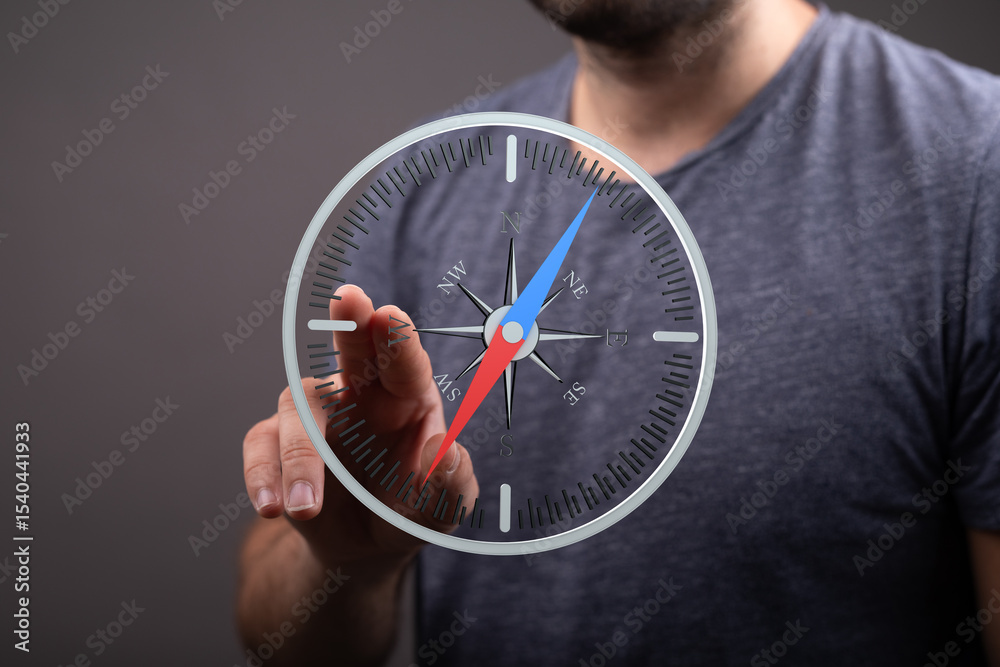 Poster a man uses a finger to interact with a digital compass interface. concept of direction, guidance, st
