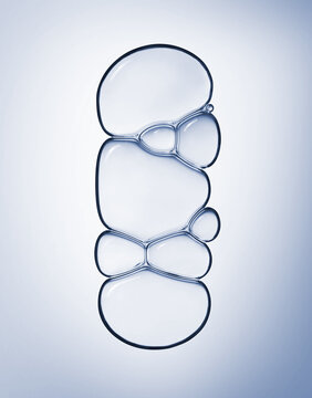 Blue clear cosmetic gel serum oil bubble texture Hyaluronic skin care moisturizer product sample with bubbles macro