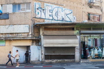 Petah Tikva, Israel, 12  JUNE 2025, A Detailed Architectural Drawing Of A Building With Hebrew Text On A Sign.