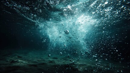 Fototapeta premium Underwater Scene with Bubbles, Light Rays, and Dark Blue Waters