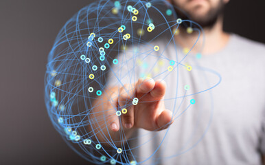 Hand interacting with a digital network, representing global connection and data.