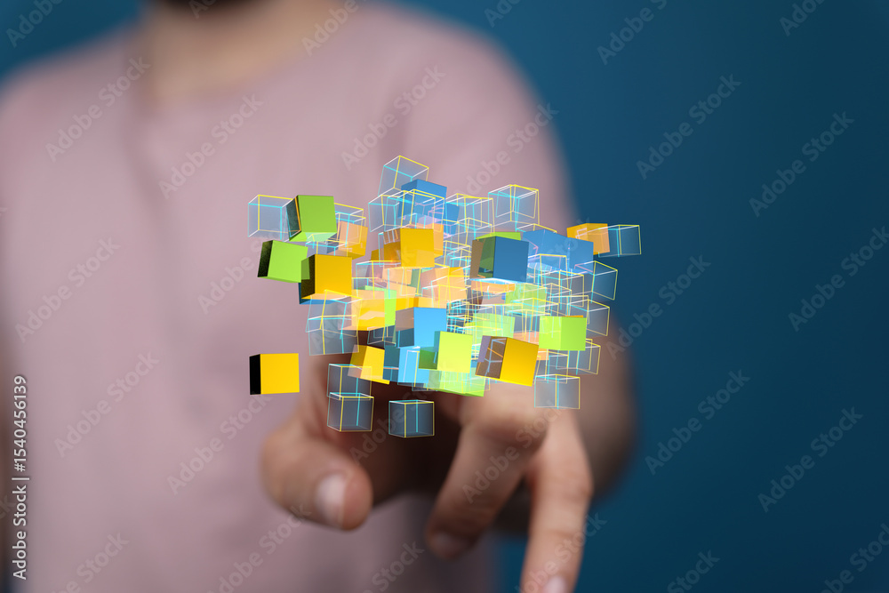 Poster Abstract image of hand interacting with colorful data cubes.  Perfect for technology, data, or innovation concepts.