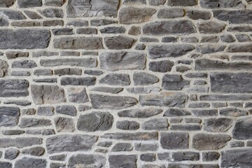 Stone wall, flat stacked background texture.