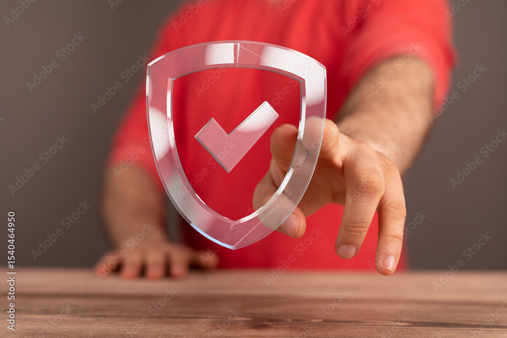 Poster image of a hand holding a digital shield, symbolizing data protection and security.
