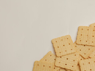 Square sweet crackers on white background