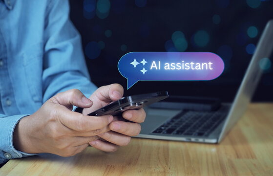 AI assistant button. Generate text, image, video tool. LLM chat bot. AI assistant for AI work, helping human work, hand holding a mobile phone, using chatboard