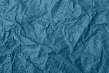 Abstract wrinkled blue crumpled paper texture background