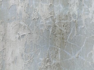 Peeling Wall Texture with Cracks and Rough Surface. Close-up of a weathered wall with peeling...