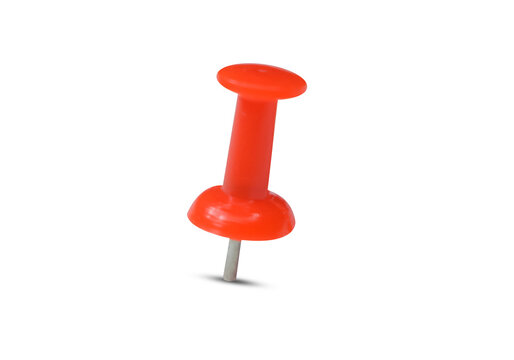 Close-up shot of a red push pin on a transparent surface
