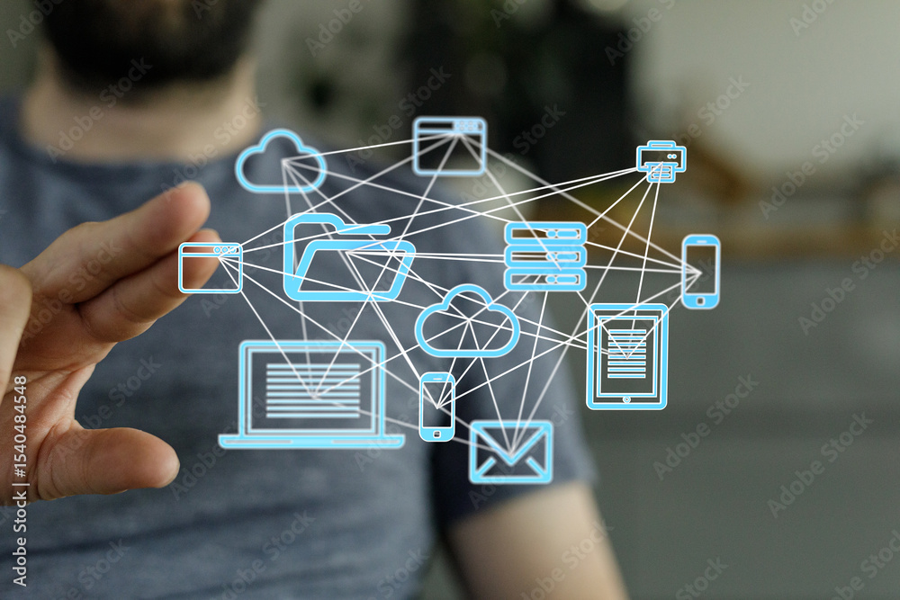 Poster A person interacts with a holographic network showing interconnected devices, cloud storage, and data flow.
