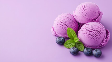 Berry Bliss: An artistic presentation of three scoops of vibrant blueberry ice cream, accompanied by fresh mint leaves and succulent blueberries, offering a refreshing visual treat. 