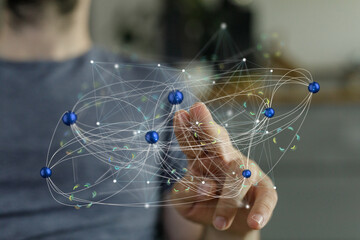Abstract image of a person interacting with a digital network.  Ideal for technology, connection,...