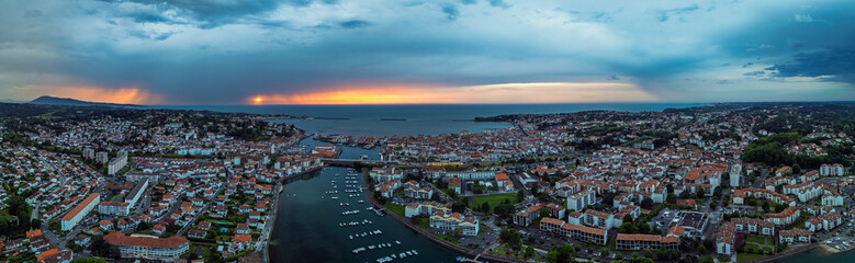 Panorama of Sunset over Saint-Jean-de-Luz from a drone, Nouvelle-Aquitaine, Pyrenees-Atlantiques, France, Europe