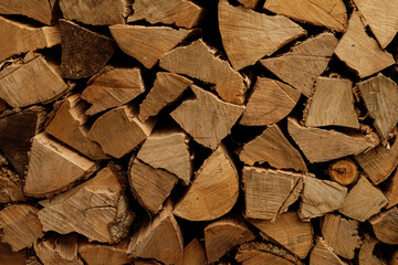High-resolution image of neatly stacked firewood. Perfect for rustic, nature, or autumn themes.