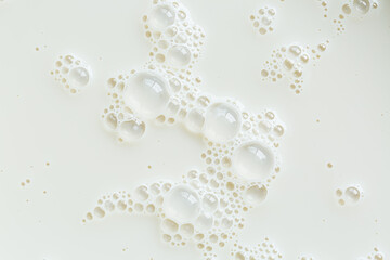 White soy milk bubble foam in cup on top view close up for food and drink background,White soy milk bubble foam in cup on top view close up for food and drink background