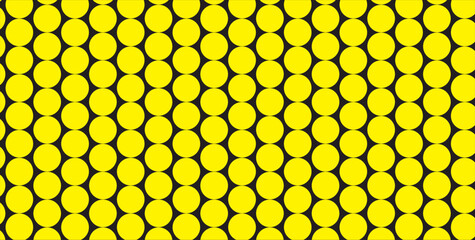 A detailed close up of a yellow and black honeycomb pattern with a repeating oval shape design element