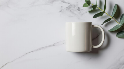 Minimalist flat lay of white ceramic coffee mug on marble with eucalyptus sprig and soft shadows

