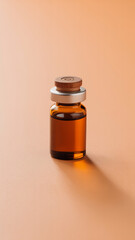 Minimalist product photography of an amber glass vial with wooden cap and dark liquid against a peach background

