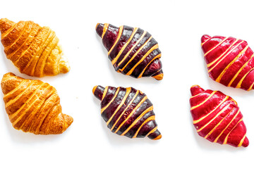 Croissants pattern - set of snacks on white background