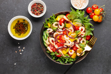 Easy  salad of fresh cucumber, tomato, sweet pepper, shrimps and onion . Healthy food. Top view