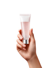 A hand holding a tube of makeup