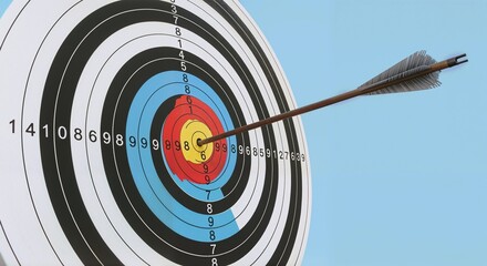 dart hitting target isolated on solid sky blue background
