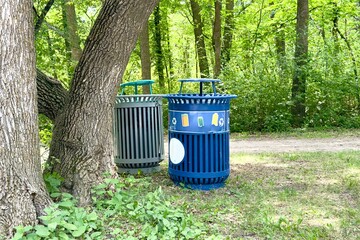 waste bins for separate waste collection in the park