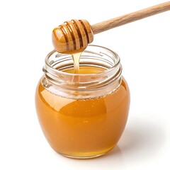 Honey dripping from wooden dipper into glass jar isolated on white background