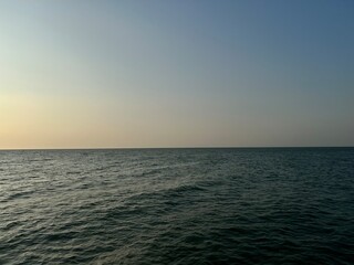 The sea and sky are separated in this evening photo of Thailand's eastern coast taken just before sunset.