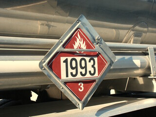 Class 1993 flammable placard on side of diesel fuel tanker.