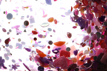 pink glitter, crystals and stones and bubbles in the water, beautiful original shiny background, glitter tornado