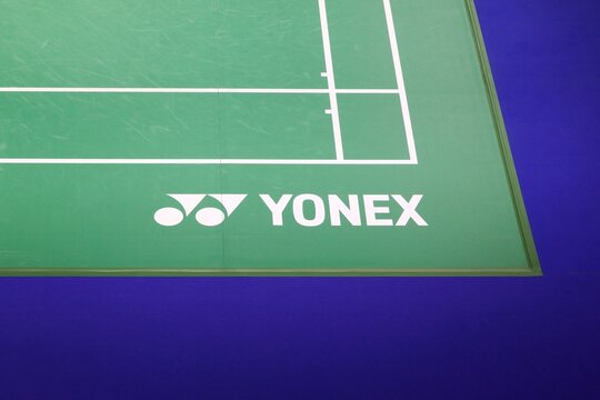 Horsens, Denmark - April 9, 2025: Yonex logo on a badminton court. Yonex is a Japanese sports equipment manufacturing company	