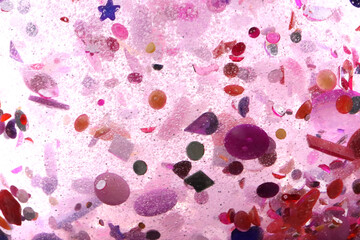 pink glitter, crystals and stones and bubbles in the water, beautiful original shiny background, glitter tornado