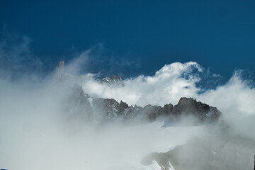 View of Mont Blanc in the fog from the Torino refuge, Punta Helbronner, Aosta, Aosta Valley, Italy, Europe