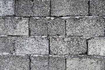 Rough concrete cinder block wall texture for background or construction design