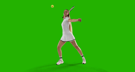 Woman tennis player playing tennis on green screen background.