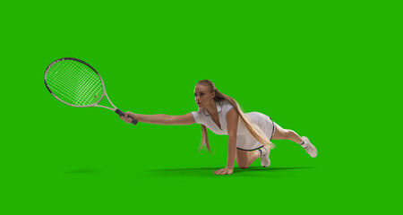 Woman tennis player playing tennis on green screen background.