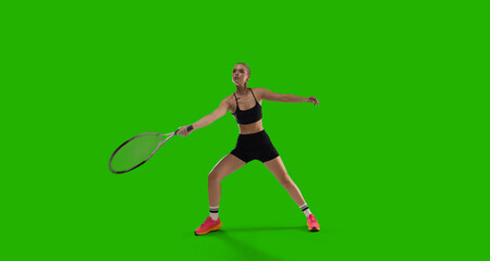 Woman tennis player playing tennis on green screen background.