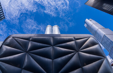 Unique pillowed and reflective retractable shell over the Shed in Hudson Yards New York City with skyscrapers above