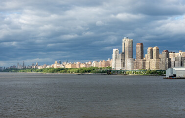 Tall traditonal apartment buidlings along the Riverside Boulevard waterfront in Manhattan seen from Hudson