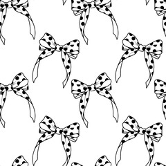 Seamless pattern with hand drawn polka dot bows. Black and white cute background for textile design, wrapping paper, anniversary, girly, kids party