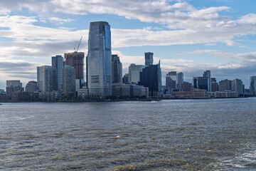 City Skyline of Jersey City seen from the Hudson river in the later afternoon