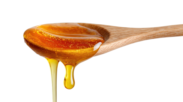 Golden Honey Dripping off a Wooden Spoon on Transparent Background

