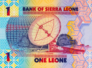 Fototapeta premium Banknote 1 Leone Sierra Leone with the image of a telecommunications satellite antenna. Money Sierra Leone