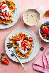 Viennese cottage cheese waffles with berries and sour cream for breakfast. Delicious healthy...