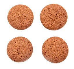 Four round chocolate cookies resting on white background