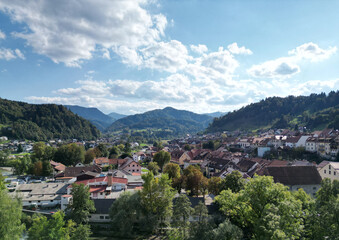 aerial view of village in the julian alps (slovenia) with mountains in the background beautiful...