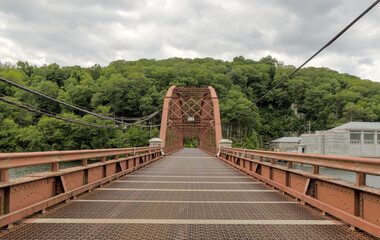 scenic steel metal bridge road crossing over old croton aqueduct in upstate new york (nyc city...