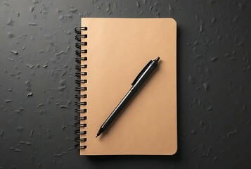 Notebook and pen on a wooden desk, perfect for jotting down business notes or personal diary entries.